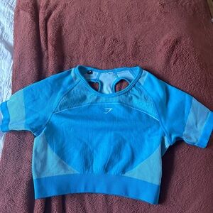 Women’s blue cropped gymshark workout shirt size medium